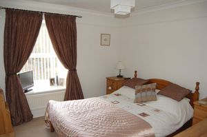 Bedroom One- click for photo gallery